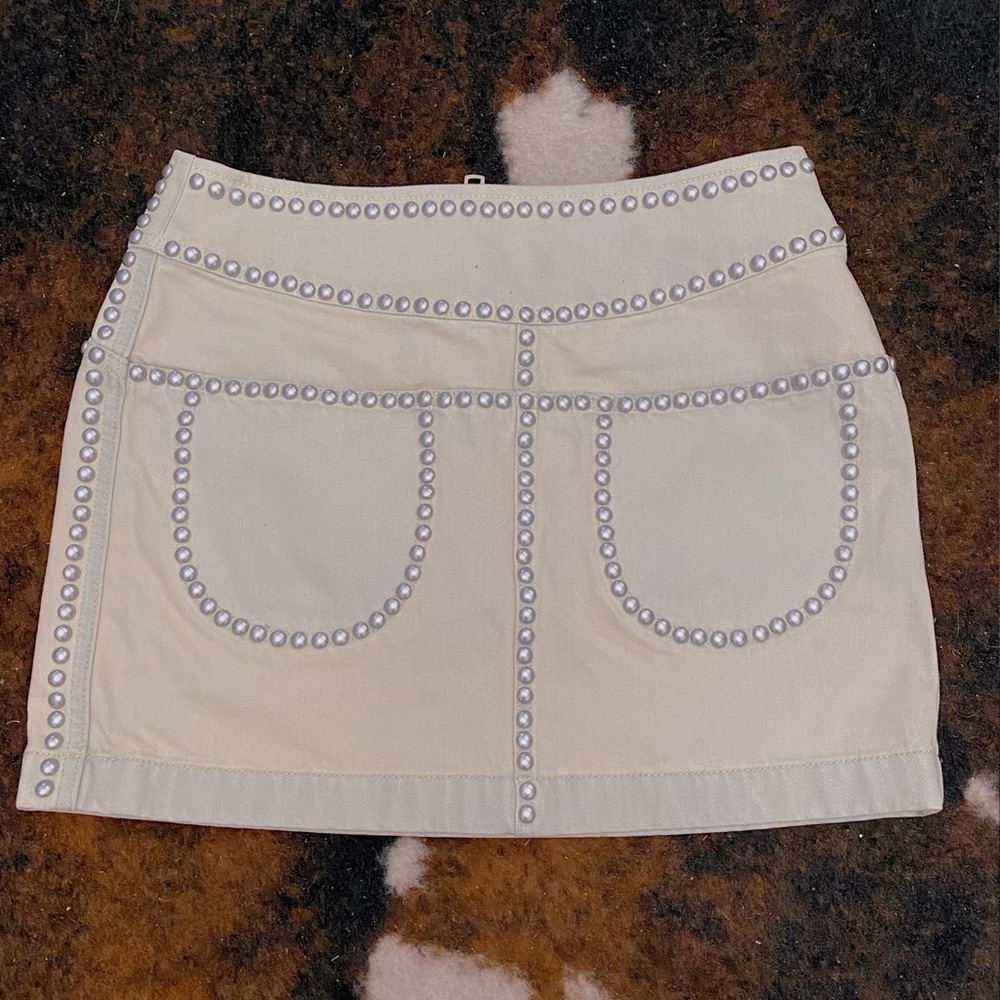 Authentic denim studded cream coach skirt